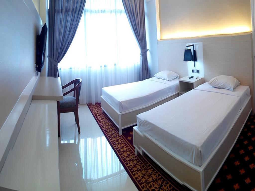 Hotel Sandjaja Palembang Szoba fotó